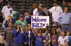 Chris Humphreys/USA Today Sports An excited group of Cubs fans in Denver roll out the blue carpet for hyped rookie Javier Baez earlier this week.