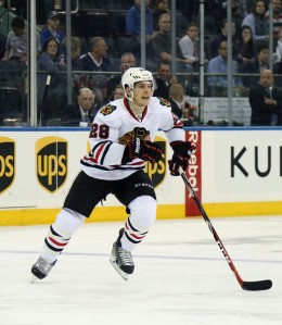 Bruce Bennett/Getty Images Ben Smith, here skating in the preseason against New York, stands to be a key contributor among the Chicago Blackhawks' up-and-coming talent this season.